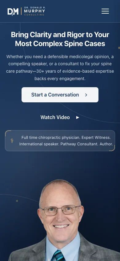 The Dr. Murphy home page on a phone — the navy hero, a hamburger nav and his portrait, rendered responsively for the small screen.