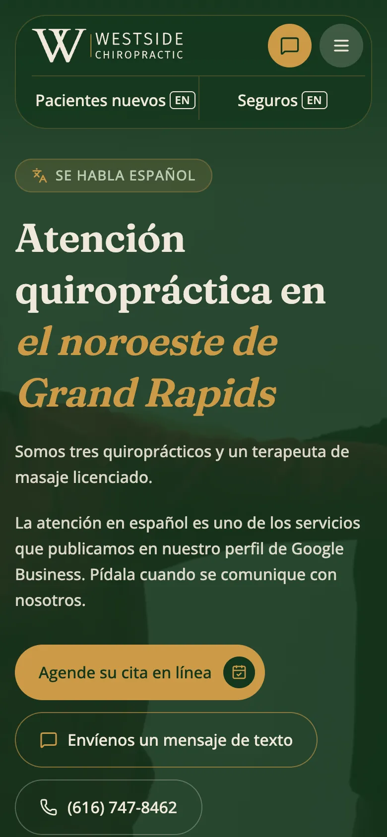 The Spanish home page on a phone, with online booking and a text line.
